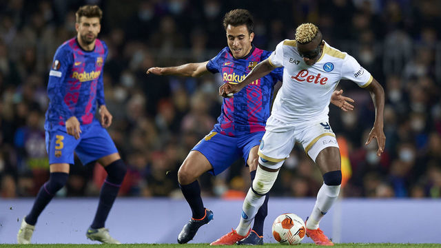 Victor Osimhen of Napoli and Eric Garcia of Barcelona compete for the ball during the UEFA Europa League Knockout Round Play-Off Leg One match between FC Barcelona and SSC Napoli at Camp Nou on February 17, 2022 in Barcelona, Spain.