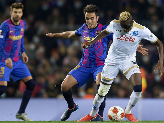 Victor Osimhen of Napoli and Eric Garcia of Barcelona compete for the ball during the UEFA Europa League Knockout Round Play-Off Leg One match between FC Barcelona and SSC Napoli at Camp Nou on February 17, 2022 in Barcelona, Spain.
