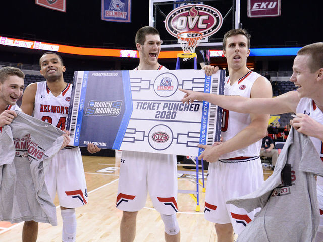 EVANSVILLE, IN - MARCH 07: Belmont Bruins players hold up their ticket and championship shirts at the conclusion of the Ohio Valley Conference Tournament championship game between the Murray State Racers and the Belmont Bruins on March 7, 2020, at the Ford Center in Evansville, Indiana.
