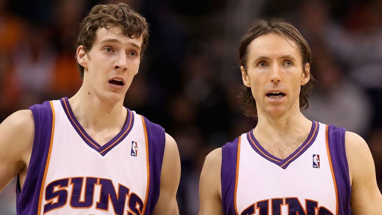 PHOENIX - JANUARY 23: Goran Dragic #2 and Steve Nash #13 of the Phoenix Suns talk during the NBA game against the Golden State Warriors at US Airways Center on January 23, 2010 in Phoenix, Arizona. The Suns defeated the Warriors 112-103.