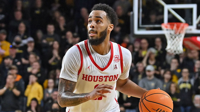WICHITA, KS - FEBRUARY 20: Kyler Edwards #11 of the Houston Cougars dribbles the ball up court during the second half against the Wichita State Shockers at Charles Koch Arena on February 20, 2022 in Wichita, Kansas.