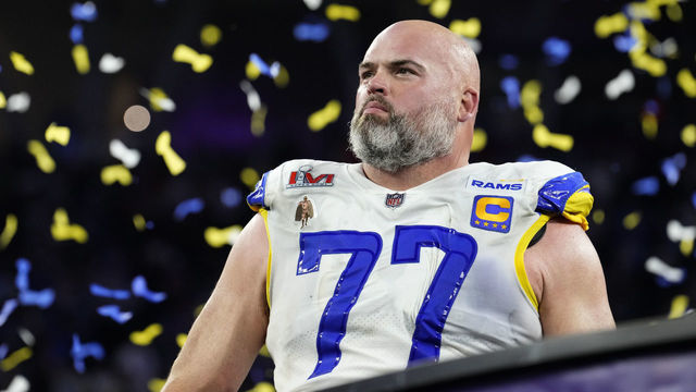 Inglewood, CA - February 13: Andrew Whitworth of the Los Angeles Rams stands up at the podium after the Rams defeat the Cincinnati Bengals 23-20 in an NFL Super Bowl LVI football game at SoFi Stadium in Inglewood, on Sunday, February 13, 2022.