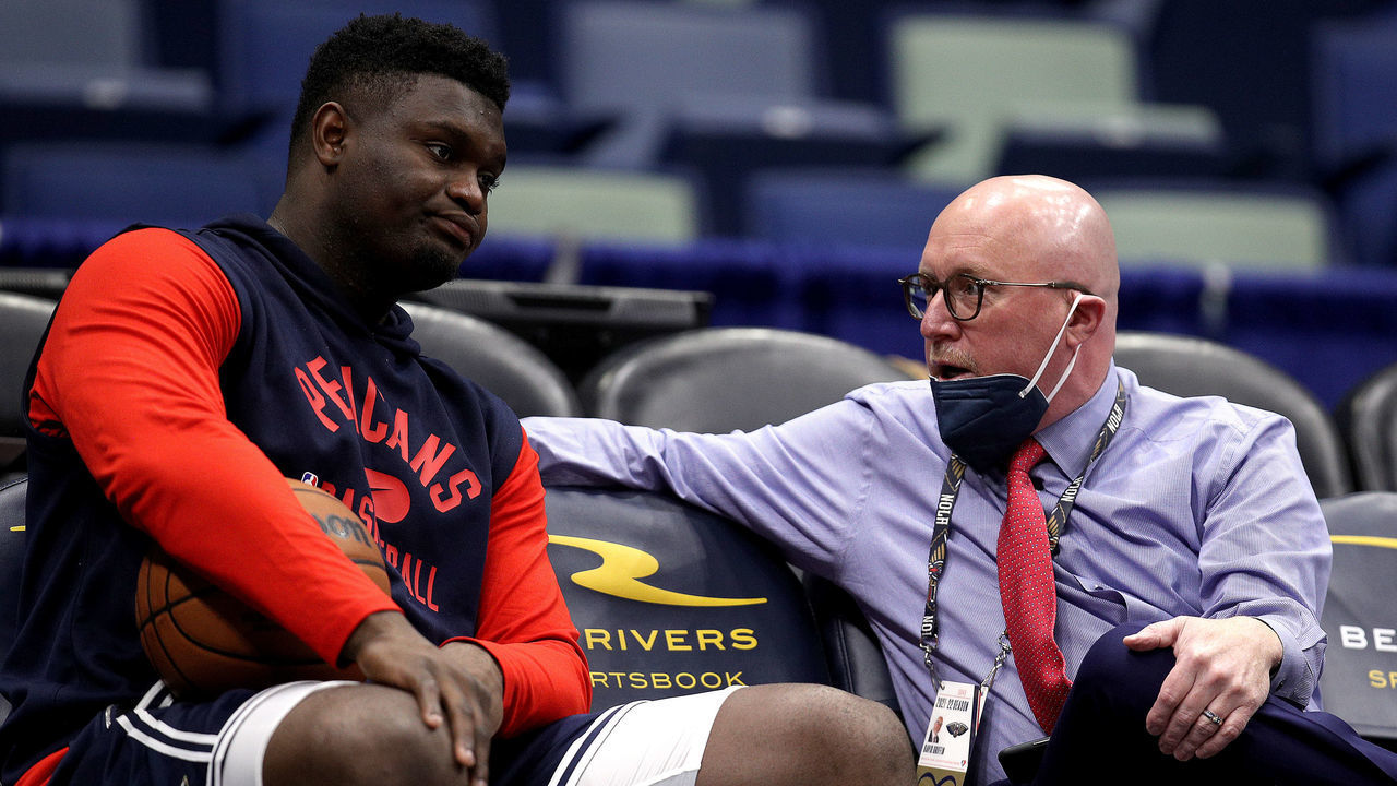 NEW ORLEANS, LOUISIANA - NOVEMBER 13: Zion Williamson #1 of the New Orleans Pelicans speaks with David Griffin executive vice president of basketball operations for the New Orleans Pelicans at Smoothie King Center on November 13, 2021 in New Orleans, Louisiana.
