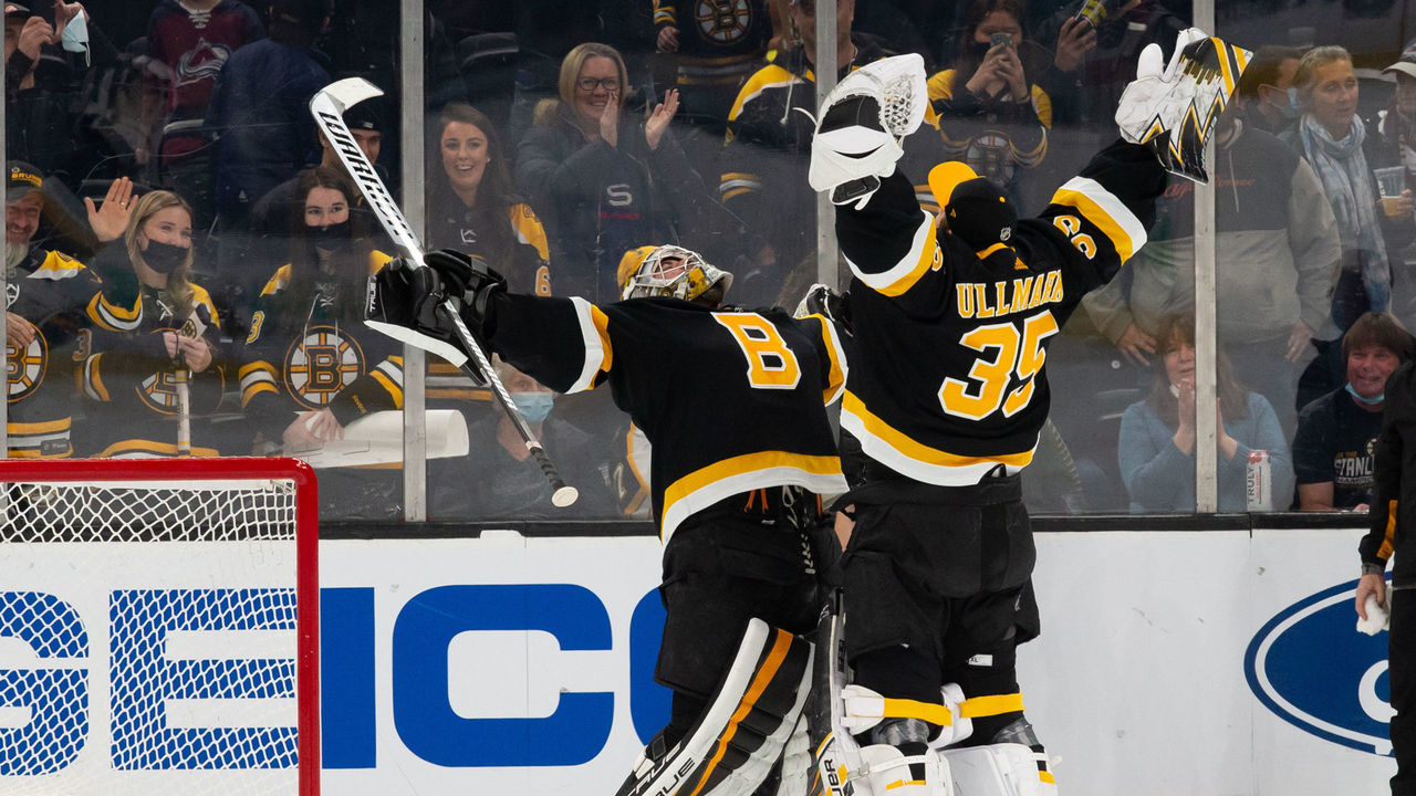 BOSTON, MA - FEBRUARY 21: Jeremy Swayman #1 of the Boston Bruins and teammate Linus Ullmark #35 celebrate a 5-1 victory against the Colorado Avalanche at the TD Garden on February 21, 2022 in Boston, Massachusetts.