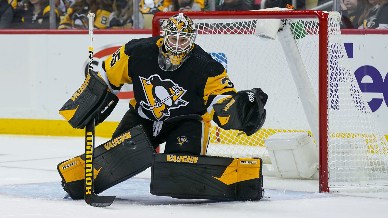 PITTSBURGH, PA - FEBRUARY 20: Pittsburgh Penguins goaltender Tristan Jarry (35) makes a save during the second period in the NHL game between the Pittsburgh Penguins and the Carolina Hurricanes on February 20, 2022, at PPG Paints Arena in Pittsburgh, PA.