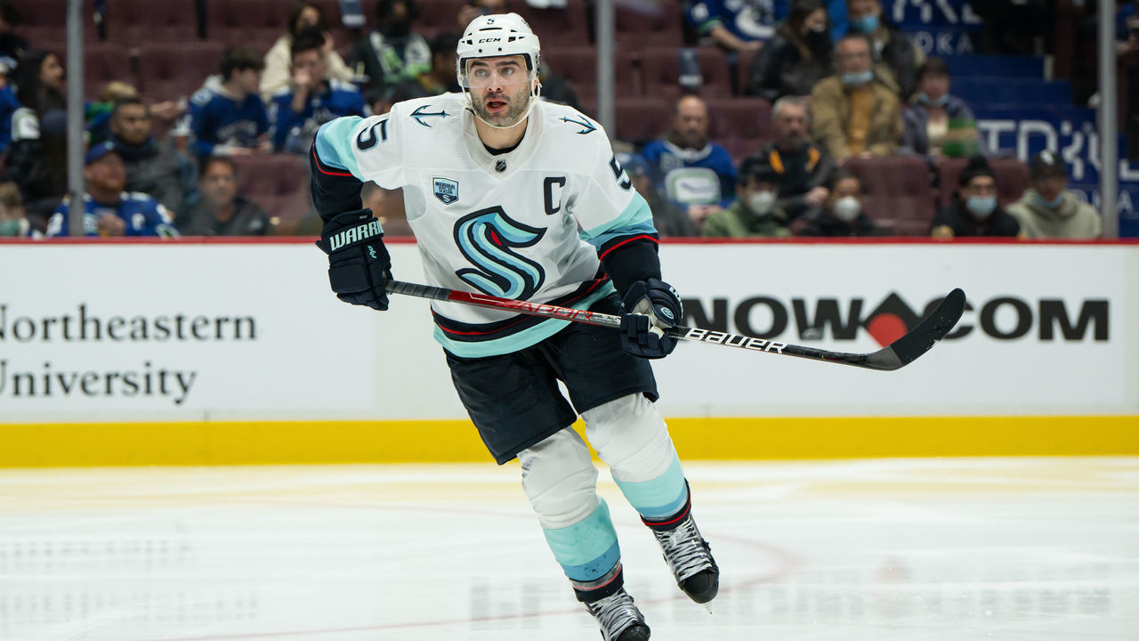 VANCOUVER, BC - FEBRUARY 21: Seattle Kraken defenseman Mark Giordano (5) skates up ice during their NHL game against the Vancouver Canucks at Rogers Arena on February 21, 2022 in Vancouver, British Columbia, Canada.