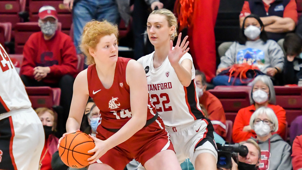PALO ALTO, CA - FEBRUARY 24: Washington State Cougars center Jessica Clarke (14) reaches an impasse with Stanford Cardinal forward Cameron Brink (22) standing her ground during the game between the Washington State Cougars and the Stanford Cardinal on Thursday, February 24, 2022 at Maples Pavilion in Palo Alto, California.