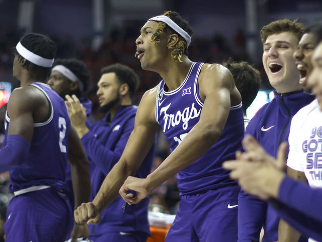 FORT WORTH, TX - FEBRUARY 26: Xavier Cork #12 of the TCU Horned Frogs and his teammates react after TCU took a lead against the Texas Tech Red Raiders in the second half at Schollmaier Arena on February 26, 2022 in Fort Worth, Texas. TCU upset Tech 69-66.