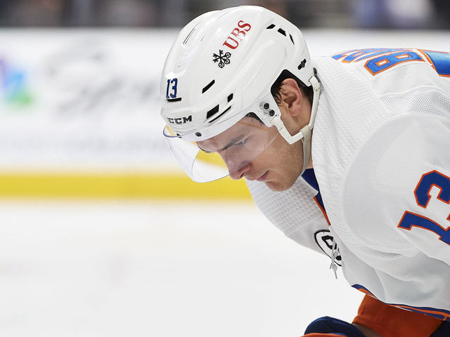 SAN JOSE, CA - FEBRUARY 24: New York Islanders center Mathew Barzal (13) prepares for a faceoff during the NHL game between the San Jose Sharks and the New York Islanders on February 24, 2022 at SAP Center in San Jose, CA.