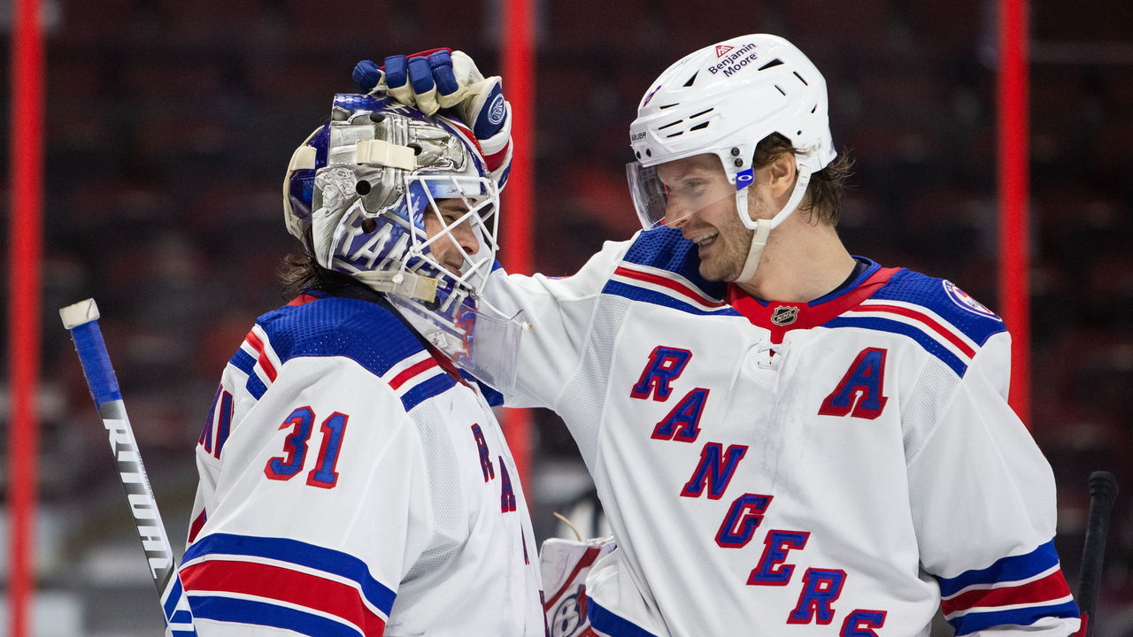 OTTAWA, ON - FEBRUARY 20: Igor Shesterkin #31 of the New York Rangers celebrates a 2-1 win against the Ottawa Senators with his teammate Jacob Trouba #8 at Canadian Tire Centre on February 20, 2022 Ottawa, Ontario, Canada