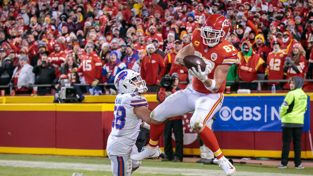 KANSAS CITY, MO - JANUARY 23: Kansas City Chiefs tight end Travis Kelce (87) makes the game winning reception in overtime during the AFC Divisional Round playoff game against the Buffalo Bills on January 23rd, 2022 at Arrowhead Stadium in Kansas City, Missouri.