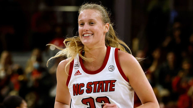 RALEIGH, NC - JANUARY 20: Elissa Cunane #33 of the NC State Wolfpack reacts near the end of their game against the Louisville Cardinals at Reynolds Coliseum on January 20, 2022 in Raleigh, North Carolina. NC State won 68-59.