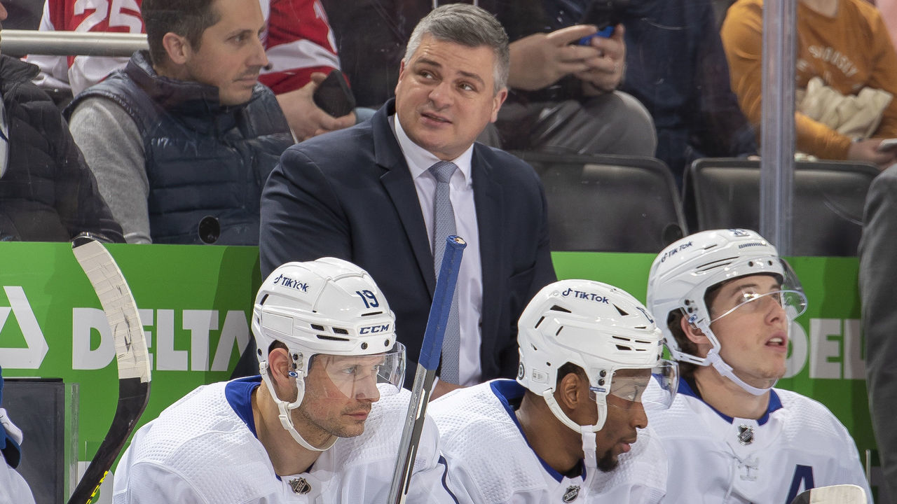DETROIT, MI - FEBRUARY 26: Head Coach Sheldon Keefe of the Toronto Maple Leafs looks on from the bench during the first period of an NHL game against the Detroit Red Wings at Little Caesars Arena on February 26, 2022 in Detroit, Michigan.