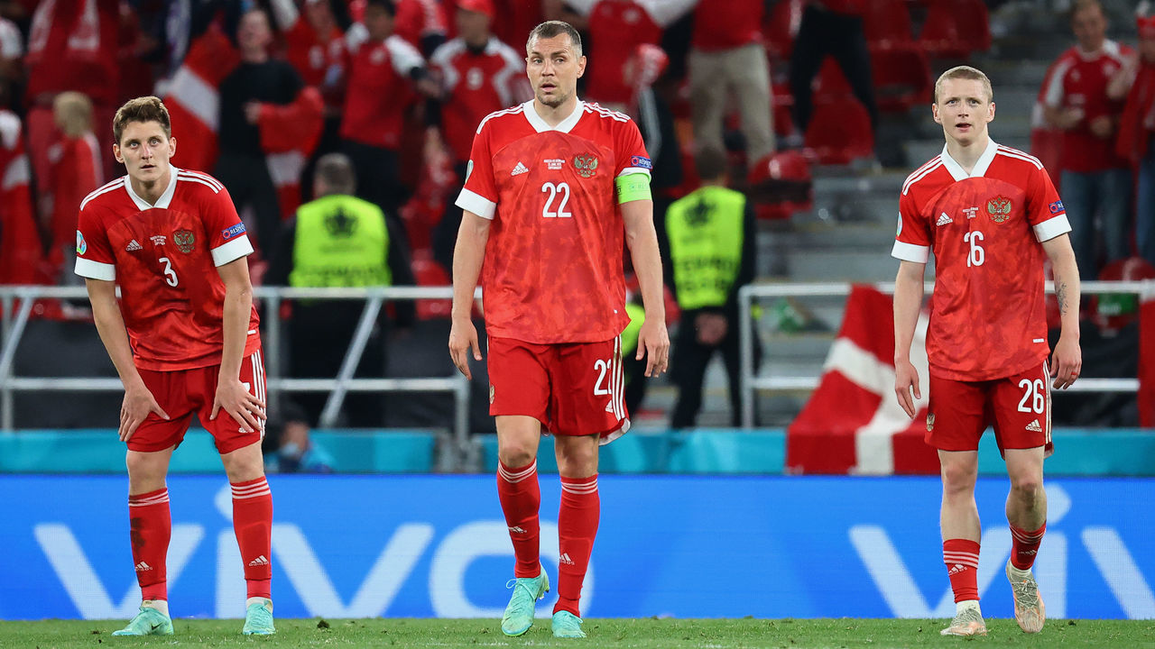 COPENHAGEN, DENMARK - JUNE 21: (L - R) Igor Diveev, Artem Dzyuba and Maksim Mukhin of Russia look dejected after the Denmark fourth goal scored by Joakim Maehle during the UEFA Euro 2020 Championship Group B match between Russia and Denmark at Parken Stadium on June 21, 2021 in Copenhagen, Denmark.