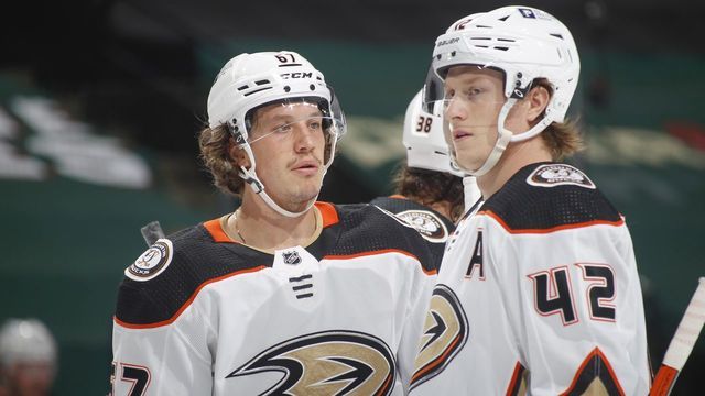 SAINT PAUL, MN - MARCH 22: Rickard Rakell #67 and Josh Manson #42 of the Anaheim Ducks talk during a break in the game against the Minnesota Wild at the Xcel Energy Center on March 22, 2021 in Saint Paul, Minnesota.