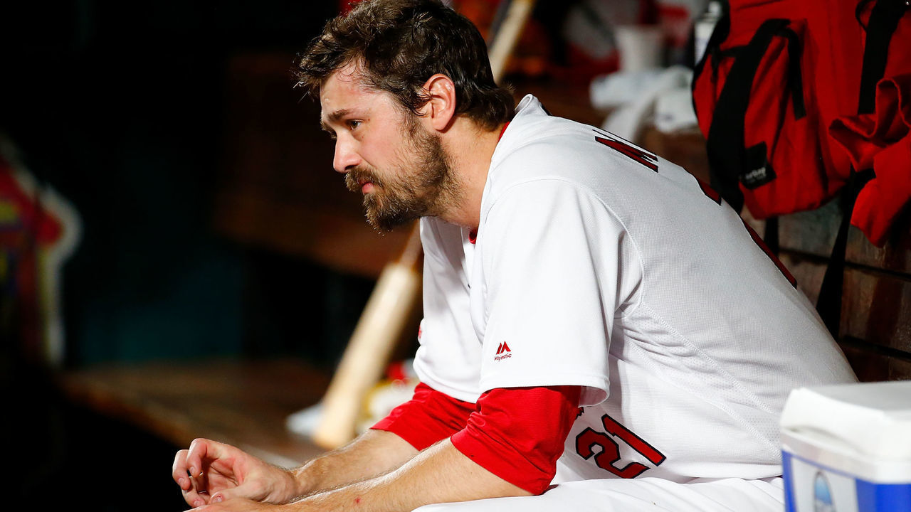 ST LOUIS, MO - JUNE 20: Andrew Miller #21 of the St. Louis Cardinals sits in the dugout after giving up a game-inns two-run home run against the Miami Marlins in the eleventh inning at Busch Stadium on June 20, 2019 in St Louis, Missouri.