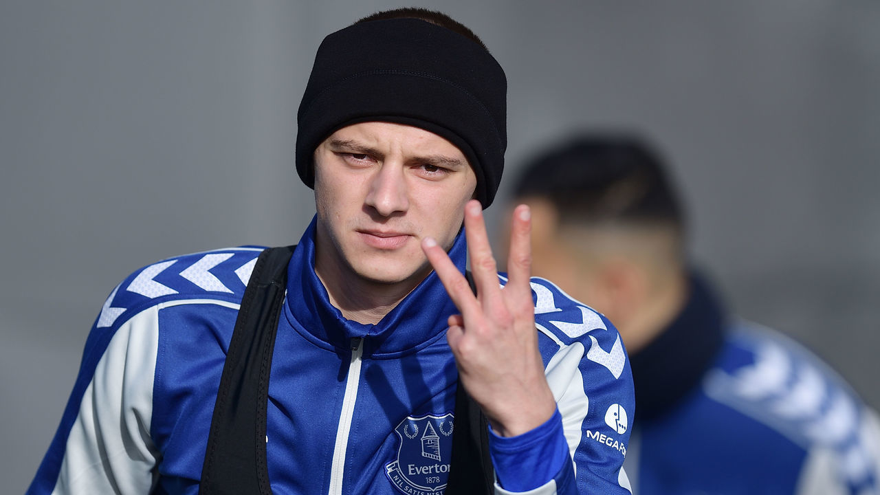 HALEWOOD, ENGLAND - MARCH 01: Vitalii Mykolenko of Everton and Ukraine with a three finger salute during the Everton training session at USM Finch Farm on March 01, 2022 in Halewood, England..
