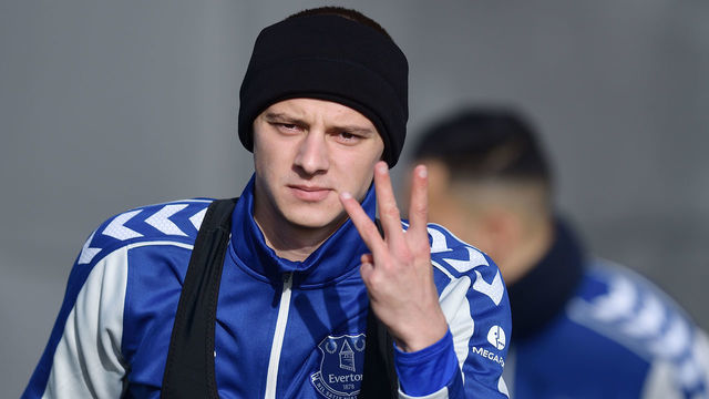 HALEWOOD, ENGLAND - MARCH 01: Vitalii Mykolenko of Everton and Ukraine with a three finger salute during the Everton training session at USM Finch Farm on March 01, 2022 in Halewood, England..