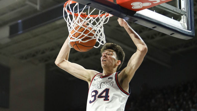 SPOKANE, WA - FEBRUARY 19: Gonzaga Bulldogs center Chet Holmgren (34) jumps and dunks the ball during the game between the Gonzaga Bulldogs and the Santa Clara Broncos on February 19, 2022, at McCarthey Athletic Center in Spokane, WA.
