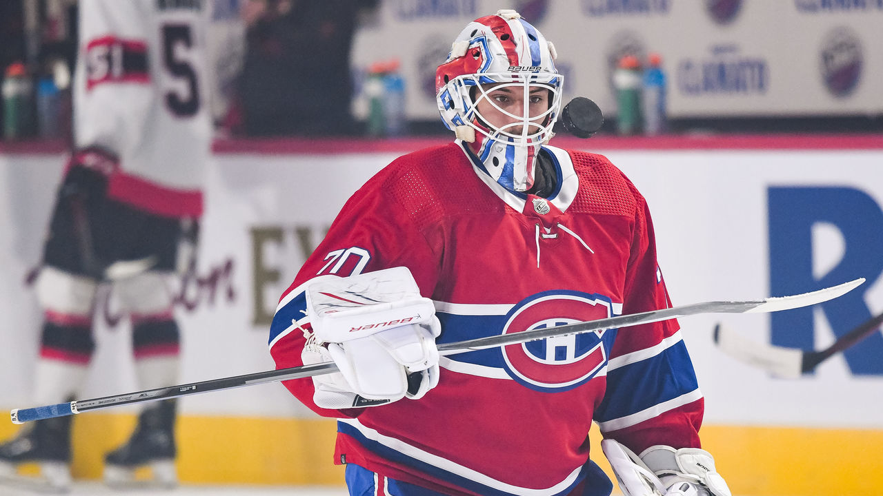 MONTREAL, QC - OCTOBER 02: Montreal Canadiens Goalie Michael McNiven (70) plays with a puck at warm-up before the Ottawa Senators versus the Montreal Canadiens preseason game on October 02, 2021, at Bell Centre in Montreal, QC