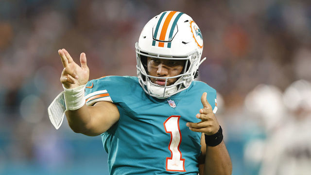 MIAMI GARDENS, FLORIDA - JANUARY 09: Tua Tagovailoa #1 of the Miami Dolphins celebrates a first down against the New England Patriots during the fourth quarter at Hard Rock Stadium on January 09, 2022 in Miami Gardens, Florida.