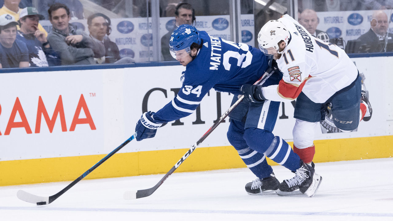 TORONTO, ON - MARCH 25: Florida Panthers Left Wing Jonathan Huberdeau (11) skates against Toronto Maple Leafs Center Auston Matthews (34) during the first period of the NHL regular season game between the Florida Panthers and the Toronto Maple Leafs on March 25, 2019, at Scotiabank Arena in Toronto, ON, Canada.