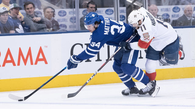 TORONTO, ON - MARCH 25: Florida Panthers Left Wing Jonathan Huberdeau (11) skates against Toronto Maple Leafs Center Auston Matthews (34) during the first period of the NHL regular season game between the Florida Panthers and the Toronto Maple Leafs on March 25, 2019, at Scotiabank Arena in Toronto, ON, Canada.