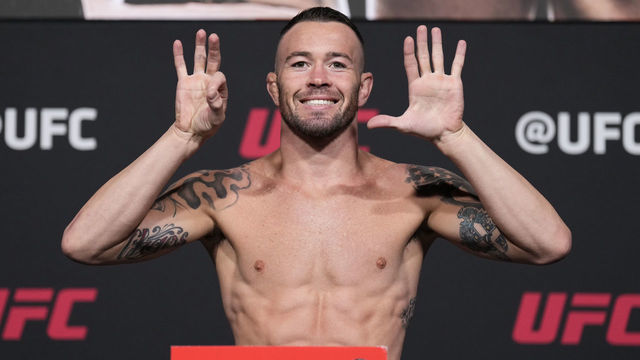LAS VEGAS, NEVADA - MARCH 04: Colby Covington poses on the scale during the UFC 272 official weigh-in at UFC APEX on March 04, 2022 in Las Vegas, Nevada.