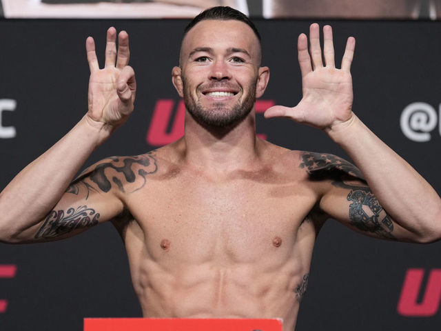 LAS VEGAS, NEVADA - MARCH 04: Colby Covington poses on the scale during the UFC 272 official weigh-in at UFC APEX on March 04, 2022 in Las Vegas, Nevada.