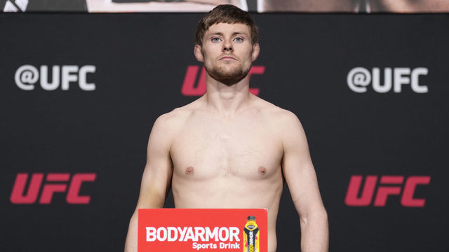 LAS VEGAS, NEVADA - MARCH 04: Bryce Mitchell poses on the scale during the UFC 272 official weigh-in at UFC APEX on March 04, 2022 in Las Vegas, Nevada.