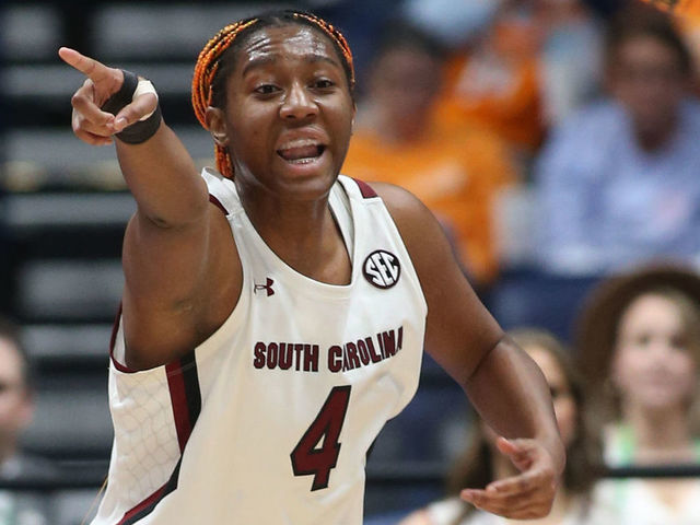 NASHVILLE, TN - MARCH 04: South Carolina Gamecocks forward Aliyah Boston (4) directs a play after making a pass to South Carolina Gamecocks guard Bree Hall (23) during a third round game of the SEC Womens Basketball Tournament between the South Carolina Gamecocks and Arkansas Razorbacks, March 4, 2022, at Bridgestone Arena in Nashville, Tennessee.