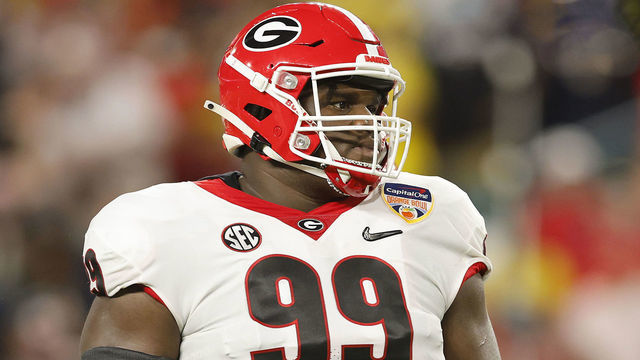 MIAMI GARDENS, FLORIDA - DECEMBER 31: Jordan Davis #99 of the Georgia Bulldogs looks on against the Michigan Wolverines in the Capital One Orange Bowl for the College Football Playoff semifinal game at Hard Rock Stadium on December 31, 2021 in Miami Gardens, Florida.