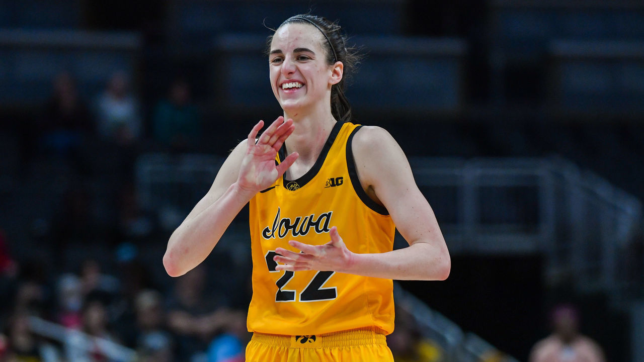 INDIANAPOLIS, INDIANA - MARCH 05: Caitlin Clark #22 of the Iowa Hawkeyes reacts after play during the second half of a Women's Big Ten Tournament Semifinals game against the Nebraska Cornhuskers at Gainbridge Fieldhouse on March 05, 2022 in Indianapolis, Indiana. The Iowa Hawkeyes won the game 83-66 over the Nebraska Cornhuskers.