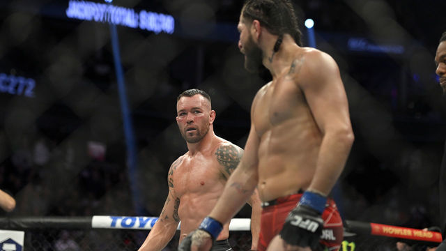 LAS VEGAS, NEVADA - MARCH 05: Colby Covington (L) and Jorge Masvidal stared down each other between rounds in their welterweight fight during UFC 272 at T-Mobile Arena on March 05, 2022 in Las Vegas, Nevada.