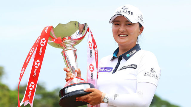 SINGAPORE, SINGAPORE - MARCH 06: Jin Young Ko of South Korea poses with the HSBC Women's World Championship trophy as she celebrates after winning during the Final Round of the HSBC Women's World Championship at Sentosa Golf Club on March 06, 2022 in Singapore.