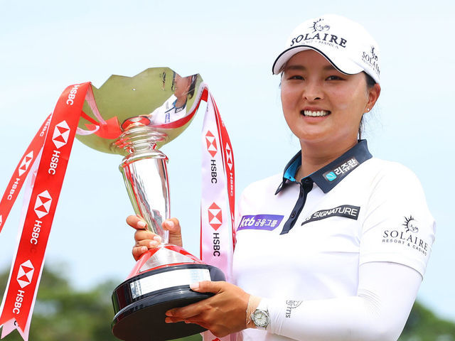 SINGAPORE, SINGAPORE - MARCH 06: Jin Young Ko of South Korea poses with the HSBC Women's World Championship trophy as she celebrates after winning during the Final Round of the HSBC Women's World Championship at Sentosa Golf Club on March 06, 2022 in Singapore.
