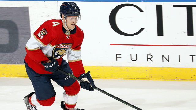 SUNRISE, FL - DECEMBER 16: Olli Juolevi #4 of the Florida Panthers skates with the puck against the Los Angeles Kings at the FLA Live Arena on December 16, 2021 in Sunrise, Florida.