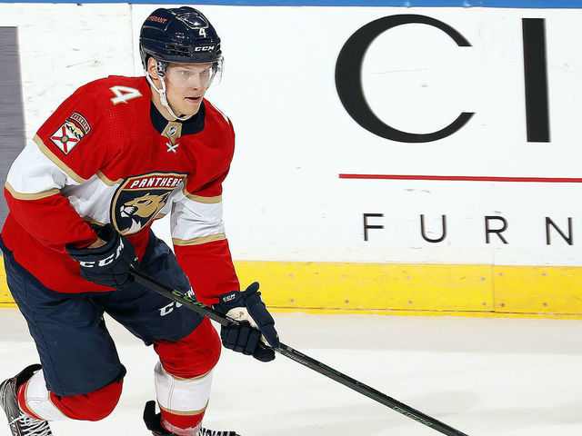 SUNRISE, FL - DECEMBER 16: Olli Juolevi #4 of the Florida Panthers skates with the puck against the Los Angeles Kings at the FLA Live Arena on December 16, 2021 in Sunrise, Florida.