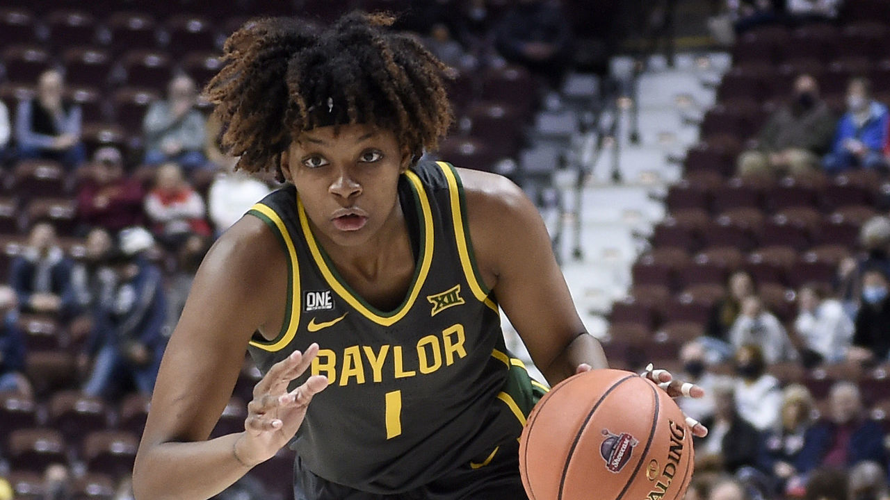UNCASVILLE, CONNECTICUT - DECEMBER 19: NaLyssa Smith #1 of the Baylor Lady Bears handles the ball against the Michigan Wolverines during the Basketball Hall of Fame Women's Showcase at Mohegan Sun Arena on December 19, 2021 in Uncasville, Connecticut.