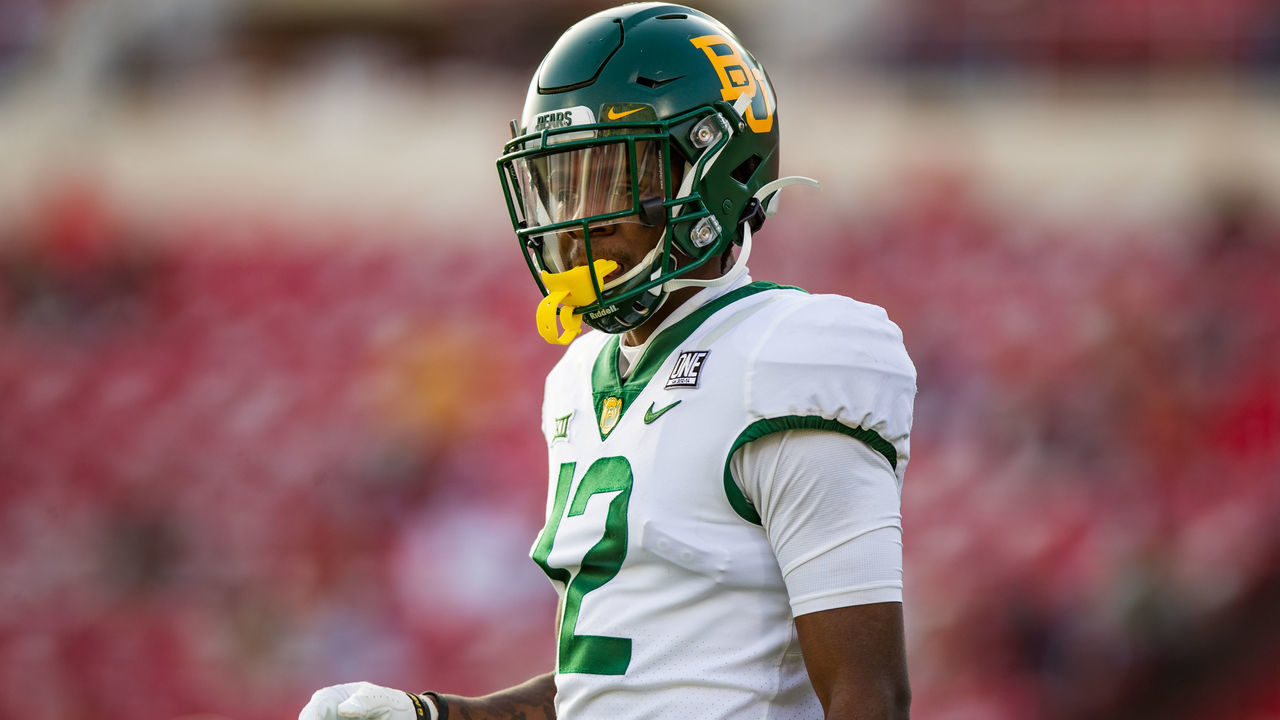 LUBBOCK, TEXAS - NOVEMBER 14: Cornerback Kalon Barnes #12 of the Baylor Bears looks to the sideline during the first half of the college football game against the Texas Tech Red Raiders at Jones AT&T Stadium on November 14, 2020 in Lubbock, Texas.