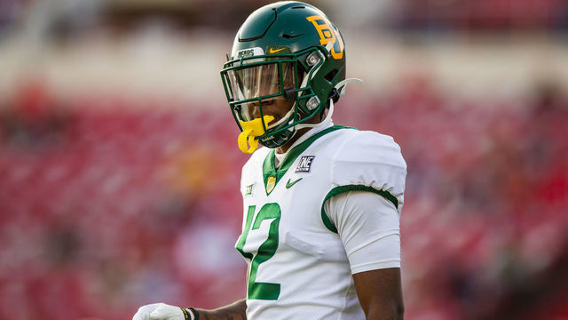 LUBBOCK, TEXAS - NOVEMBER 14: Cornerback Kalon Barnes #12 of the Baylor Bears looks to the sideline during the first half of the college football game against the Texas Tech Red Raiders at Jones AT&T Stadium on November 14, 2020 in Lubbock, Texas.