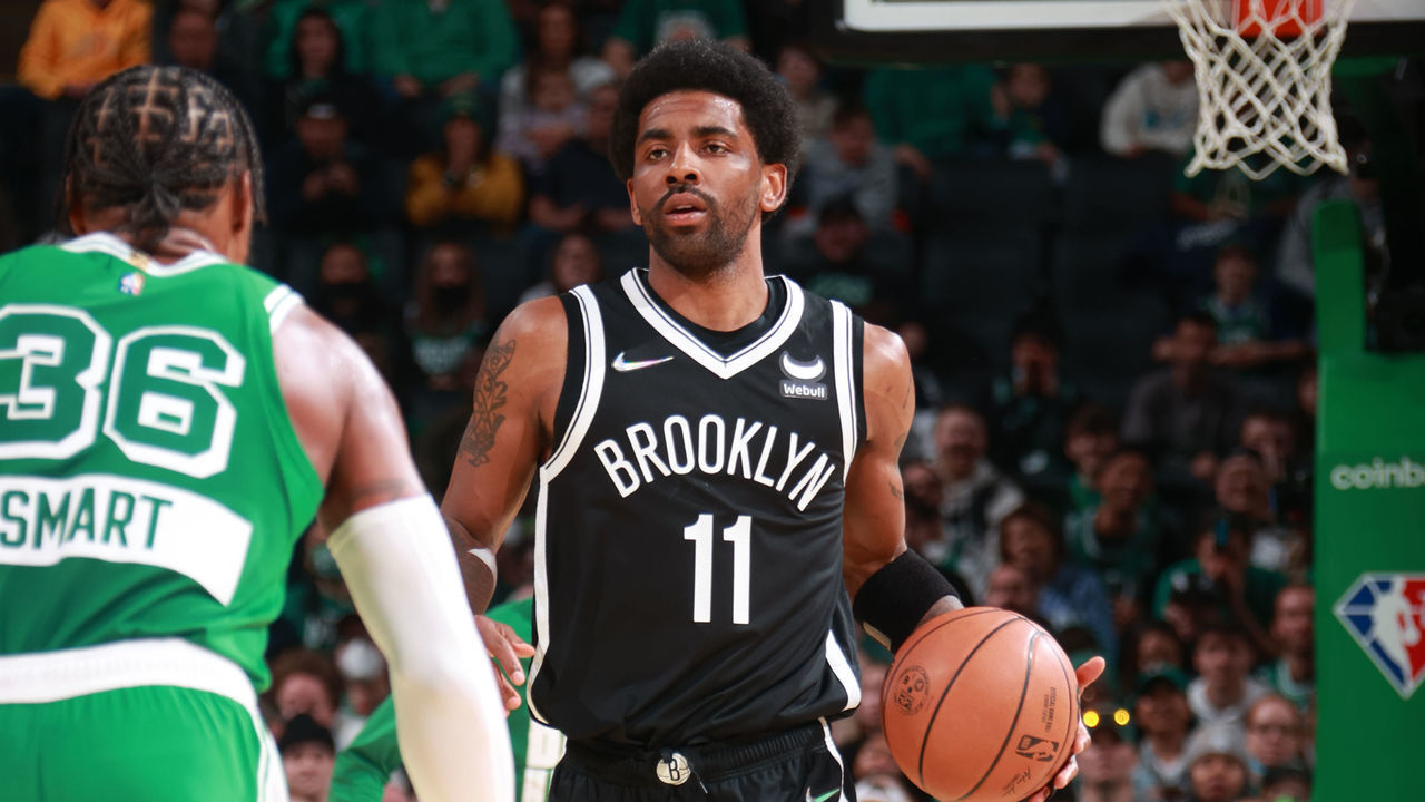 BOSTON, MA - MARCH 6: Kyrie Irving #11 of the Brooklyn Nets dribbles the ball during the game against the Boston Celtics on March 6, 2022 at the TD Garden in Boston, Massachusetts. Mandatory Copyright Notice: Copyright 2022 NBAE