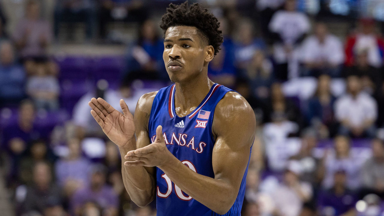 FORT WORTH, TX - MARCH 01: Kansas Jayhawks guard Ochai Agbaji (#30) claps during the Big 12 college basketball game between the TCU Horned Frogs and Kansas Jayhawks on March 01, 2022 at Ed & Rae Schollmaier Arena in Fort Worth, Texas.