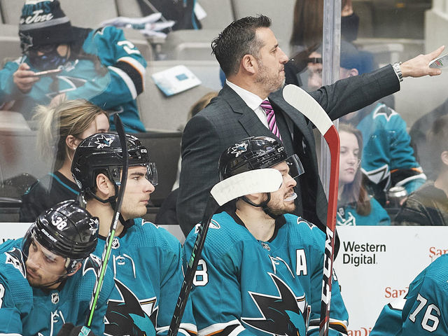 SAN JOSE, CA - JANUARY 22: San Jose Sharks head coach Bob Boughner points to his team during the NHL game between the San Jose Sharks and the Tampa Bay Lightning on January 22, 2022 at SAP Center in San Jose, CA.