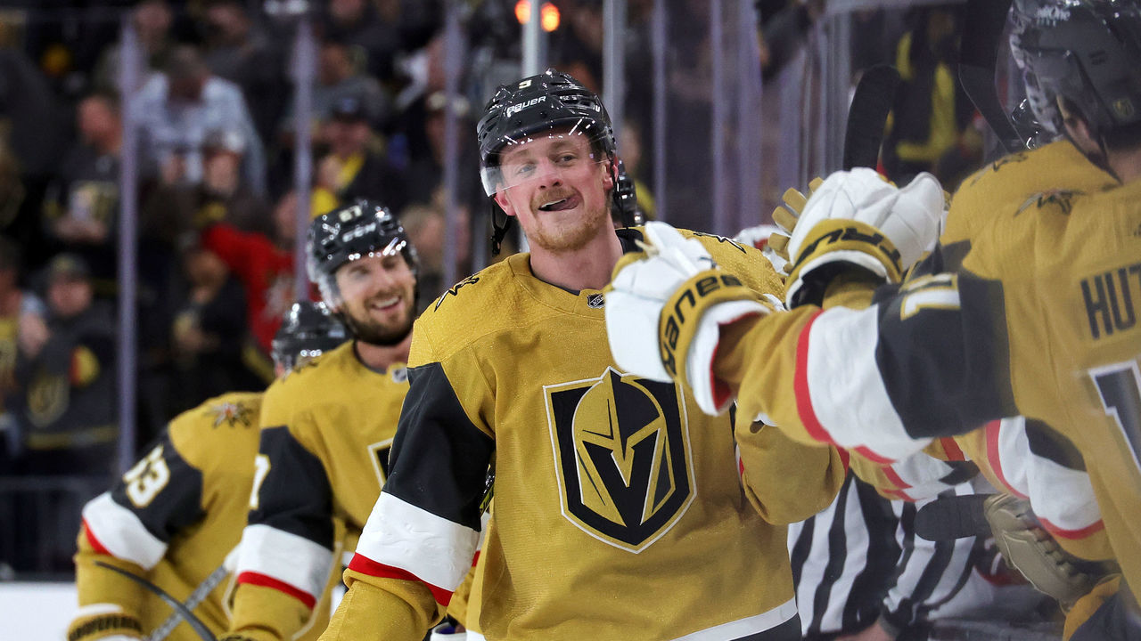 LAS VEGAS, NEVADA - MARCH 06: Jack Eichel #9 of the Vegas Golden Knights celebrates with teammates on the bench after scoring a power-play goal with 5.9 seconds left in the third period against the Ottawa Senators to win their game 2-1 at T-Mobile Arena on March 06, 2022 in Las Vegas, Nevada.