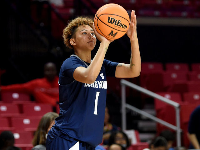 COLLEGE PARK, MARYLAND - NOVEMBER 09: Kyla McMakin #1 of the Longwood Lancers shoots the ball against the Maryland Terrapins at Xfinity Center on November 09, 2021 in College Park, Maryland.
