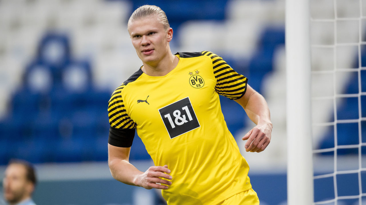 SINSHEIM, GERMANY - JANUARY 22: Erling Haaland of Borussia Dortmund celebrates scoring the opening goal during the Bundesliga match between TSG Hoffenheim and Borussia Dortmund at the PreZero-Arena on February 22, 2022 in Sinsheim, Germany.