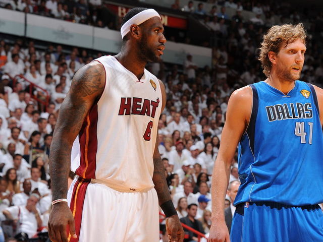 MIAMI, FL - JUNE 12: Dirk Nowitzki #41 of the Dallas Mavericks and LeBron James #6 of the Miami Heat look on during a free throw during Game Six of the 2011 NBA Finals on June 12, 2011 at the American Airlines Arena in Miami, Florida. NOTE TO USER: User expressly acknowledges and agrees that, by downloading and/or using this photograph, user is consenting to the terms and conditions of the Getty Images License Agreement. Mandatory Copyright Notice: Copyright 2011 NBAE