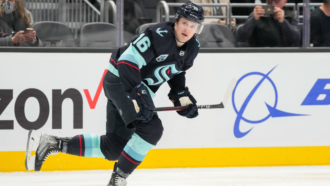 SEATTLE, WASHINGTON - FEBRUARY 14: Jared McCann #16 of the Seattle Kraken skates up ice during the second period of a game between the Toronto Maple Leafs and the Seattle Kraken at Climate Pledge Arena on February 14, 2022 in Seattle, Washington.