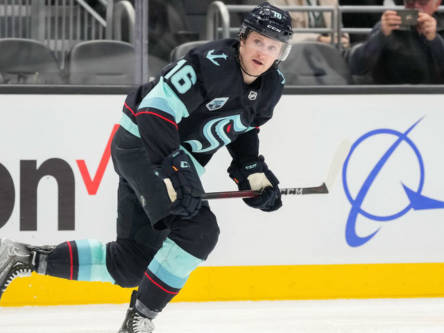 SEATTLE, WASHINGTON - FEBRUARY 14: Jared McCann #16 of the Seattle Kraken skates up ice during the second period of a game between the Toronto Maple Leafs and the Seattle Kraken at Climate Pledge Arena on February 14, 2022 in Seattle, Washington.